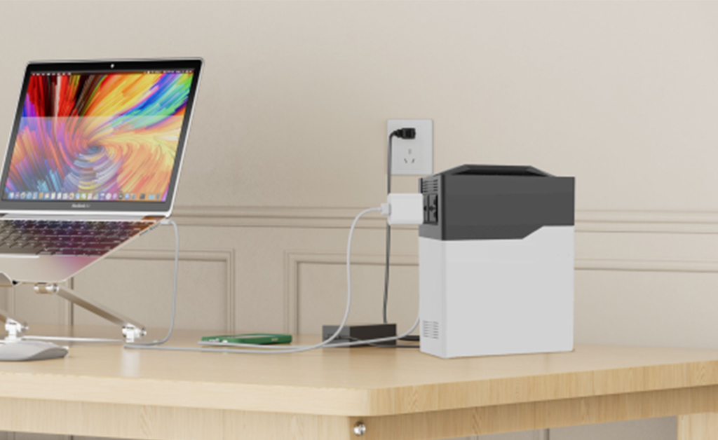 Power station charging laptop